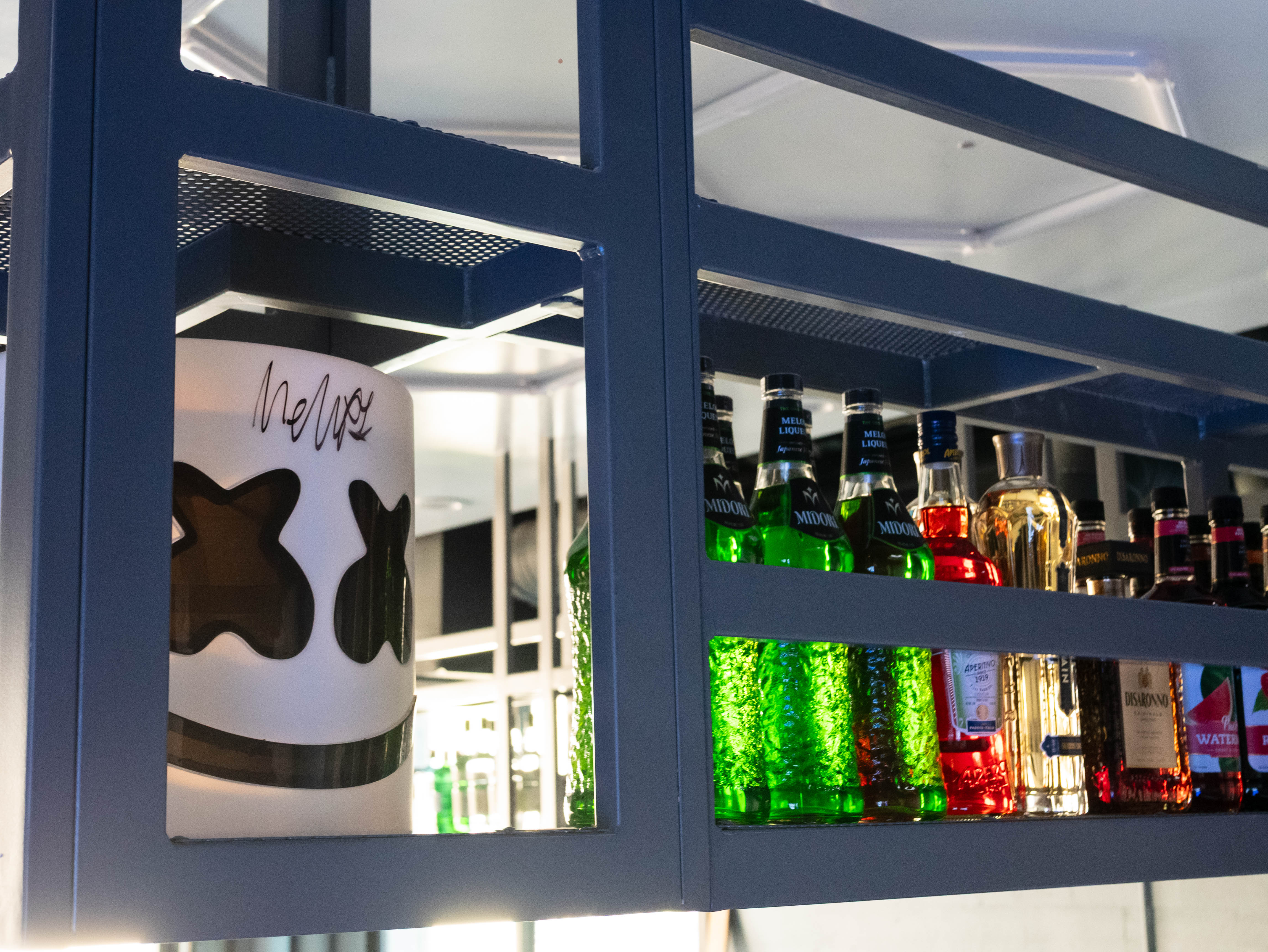 Music memorabilia displayed behind the bar at Audio Bar